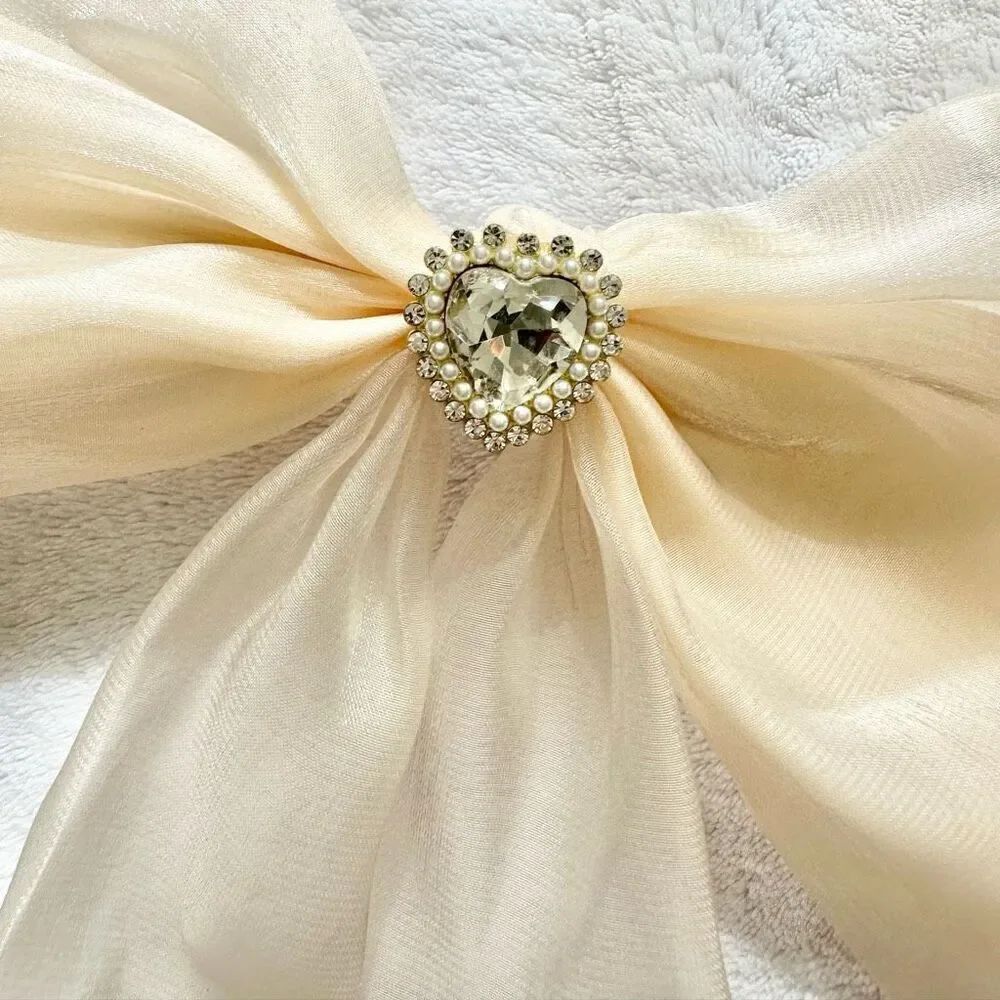 Cream sheer shiny hair bow with rhinestone heart with pearl embellishment - Picture 3 of 3